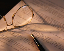 Photo: Eyeglasses and Pen